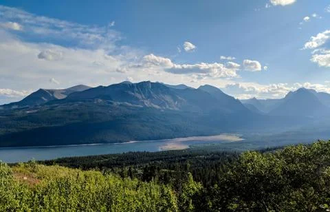 View Of Mountains Next To A River. Stock Photos