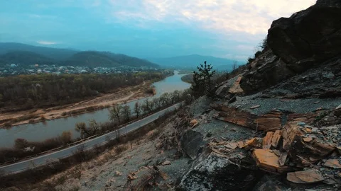 View of the mountains, road, river and rocks Stock Footage 106342134