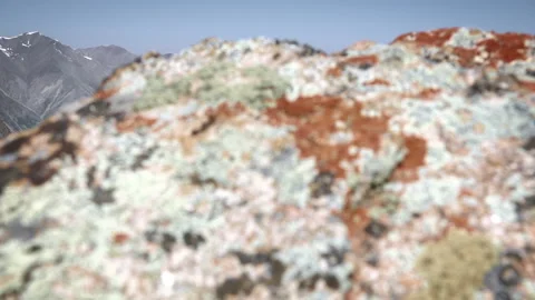 View of the mountains through a large stone 스톡 동영상 103968215