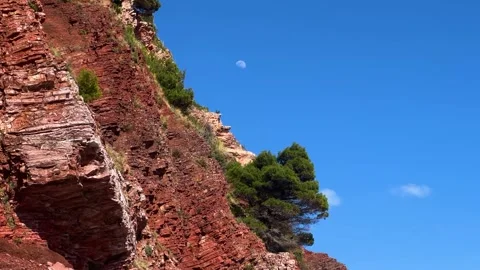View of mountains, trees and moon on the Adriatic Sea on a sunny day Stock Footage 273192373