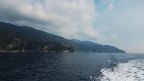 View from a moving boat of Cinque Terre and the coast Stock Footage 82393562