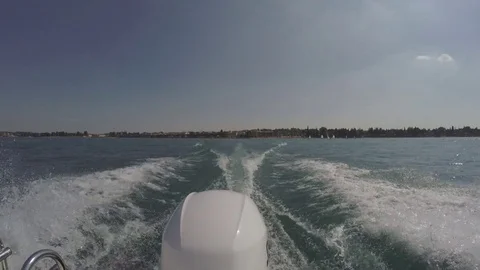 View from a moving boat engine on a lake Video stock 77071215