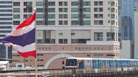 View of moving BTS skytrain at Asok metro station. Stock Footage 283944808