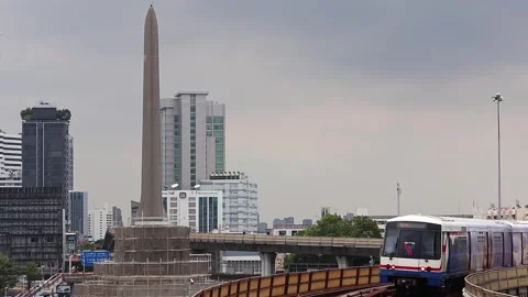 View of moving BTS skytrain at Victory Monument metro station. Stock Footage 282907656