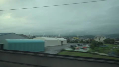 View from a moving bullet train Shinkansen in Japan. Stock Footage 137640867
