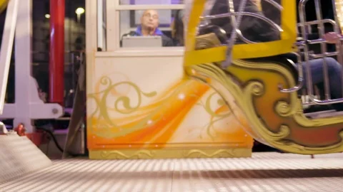 View Of Moving Cabins by Tiket Booth on Ferris Wheel Stock Footage 121549207