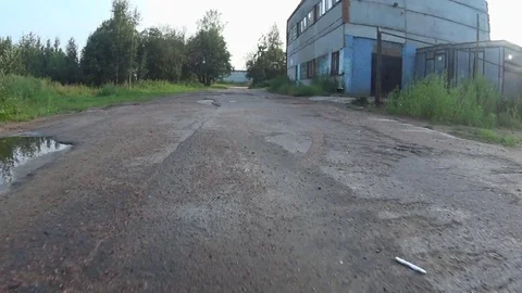 View from a moving car on the bumpy road Stock Footage 71814213