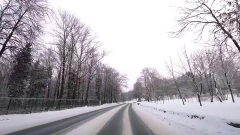 The view from a moving car outside the city of Lomonosov in the winter Stock Footage 84896908