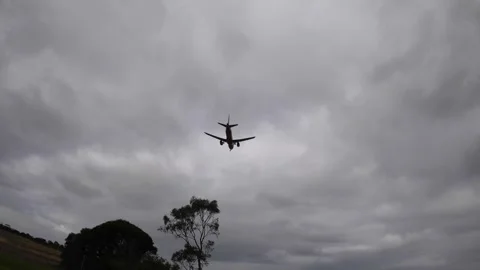 View from moving car of plane flying to Melbourne airport, Australia Stock-Footage 278098927