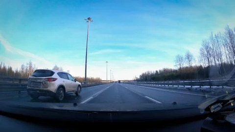 View from a moving car on the ring road of St. Petersburg in the winter Stock Photos