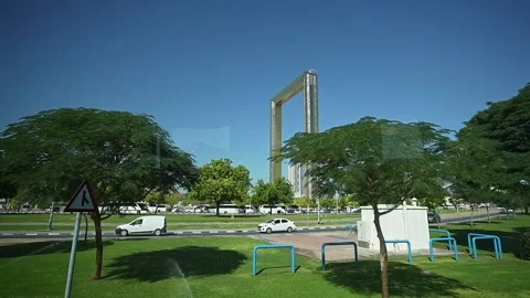 A view from a moving car on Sheikh Zayed Road, showcasing the Dubai Frame i.. Stock Footage 297938265