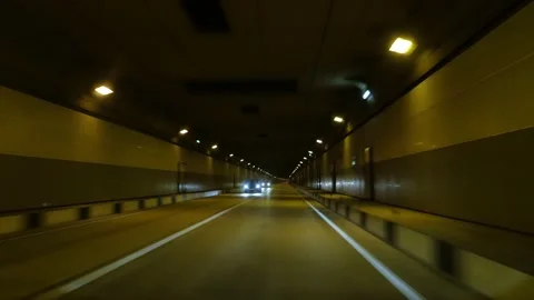 View from a moving car, underground high-speed tunnel Stock Footage 140543457