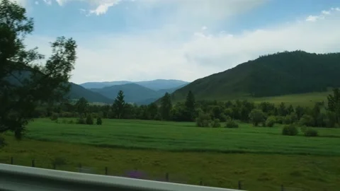 View from moving car window. Picturesque roadside. Stock Footage 208000045