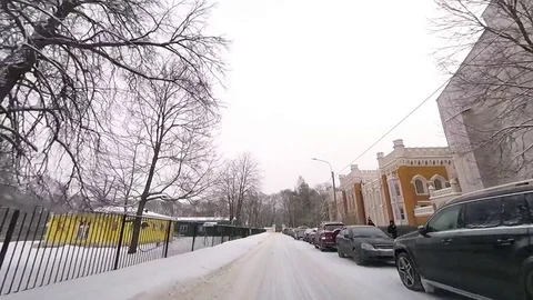 The view from a moving car in winter in Peterhof Stock Footage 84897578