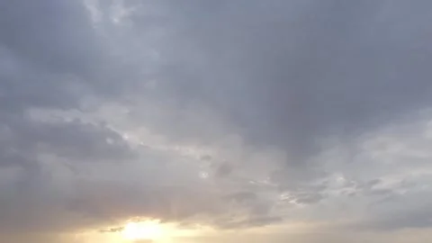 View of moving clouds on sky Time-lapse during sunset Stock Footage 243141804