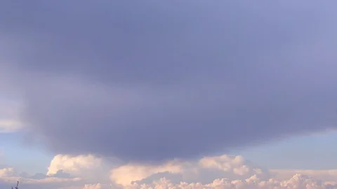 View of moving clouds at sunset Stock Footage 128984517
