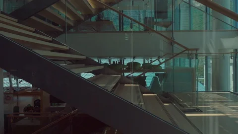 View from moving elevator on interior of modern building Stock Footage 128343392