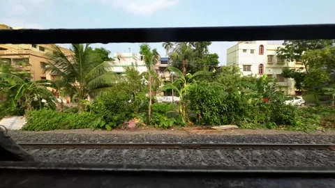 View from Moving Local Train Showing Residential Area in Kolkata, West Bengal Video stock 312888880