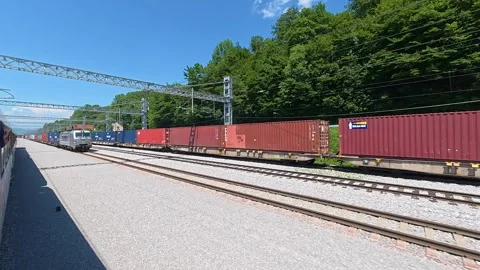 View from a moving passenger train travelling through Slovenia 스톡 동영상 339805784