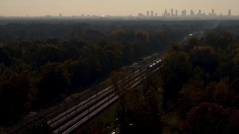 A view of a moving train and behind him panorama of Warsaw. Video stock 124844896