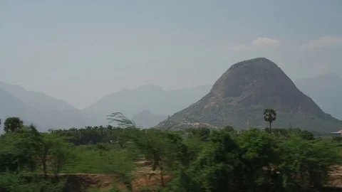 A view from the moving train in India south, day time Stock Footage
