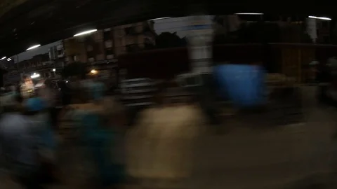 View from moving train on railway station and buildings of Kolkata evening Stock Footage 105519744