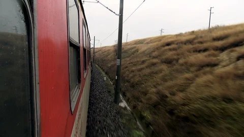 View from moving train in rainy day Stock Footage 101173390