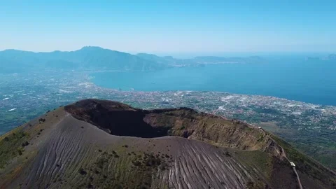 View of Mt Vesuvius with the Capri and Amalfi Coast in the background. Video stock 258947921