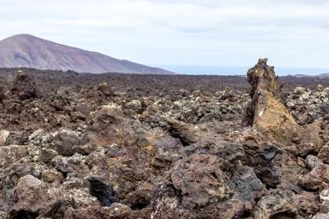 View at multi colored volcanic landscape in Timanfaya Nationalpark Stock Photos