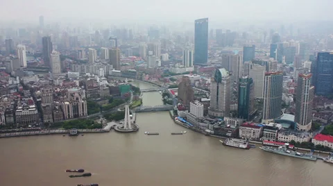 View of multiple barges sailing along river through Shanghai. Shanghai,  China Stock Footage 39196159