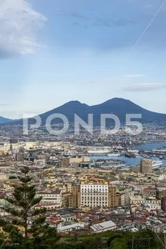 View of Naples and Mount Vesuvius coming down from Castel SantElmo Stock Photos