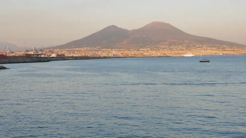 View from Naples waterfront on Vesuvius at sunset - Pan Stock Footage 150049405