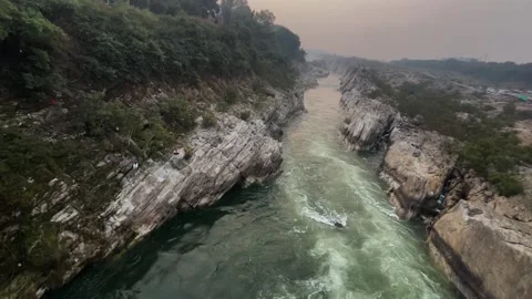 View of narmada river flowing through marbel hills from ropeway of bhedaghat of Stock Footage 313970765