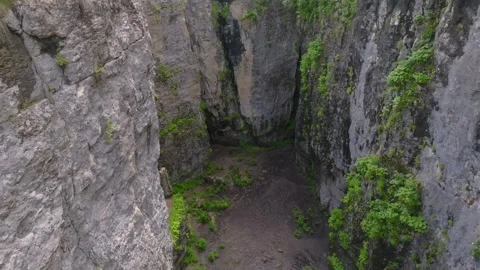 View of the narrow gorge and stone bowl at the Matlas plateau, a unique nature r Stock Footage 325821081