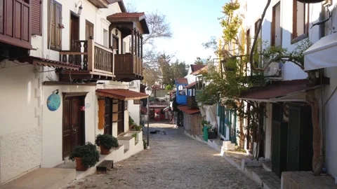 View Of A Narrow Street Between Old Houses In A Small Town In Turkey Stock Footage 195992746