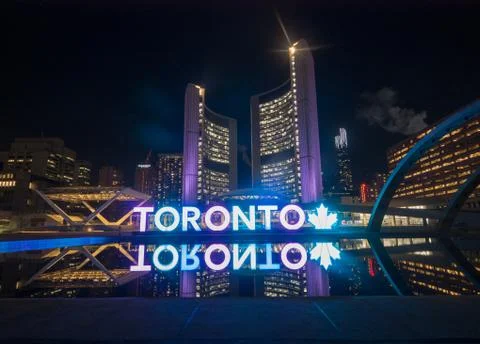 View of nathan phillips square and toronto sign in downtown at night in toron Stock Photos