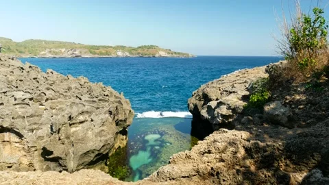 View on natural pool in small tropical island Stock Footage 159330907