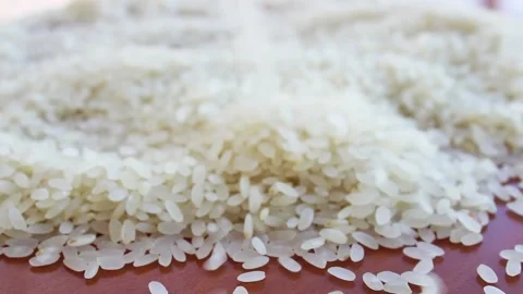 View of natural rice heap on the table Stock Footage 142164434