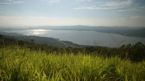 View nature of hill and river on blue sky on sunny background Vídeo Stock 219812425