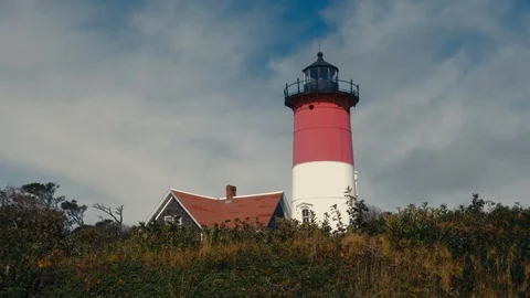 View of Nauset Light, one of the Three Sisters Lighthouses on Cape Cod, USA Stock Footage 97684179