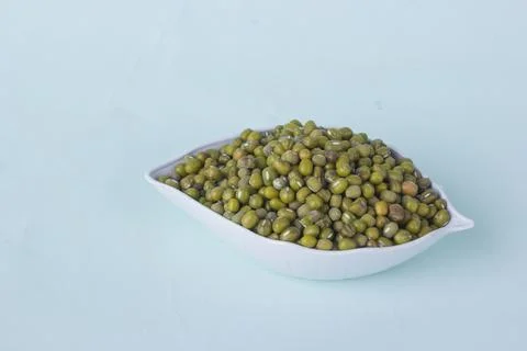 View negative space small bowl of green peas isolated Stock Photos