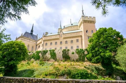 View of neogothic Bojnice castle with small fortification wall from Castle pa Stock Photos