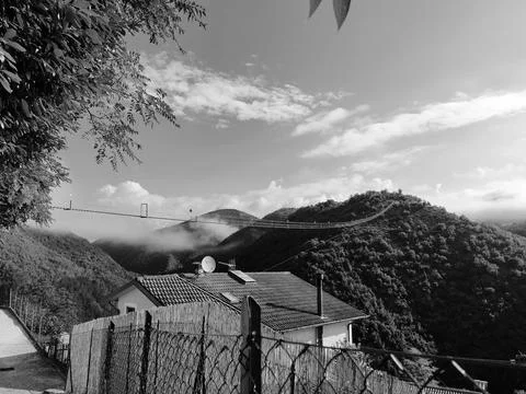 View of the new 175-meter-high Tibetan bridge Stock Photos
