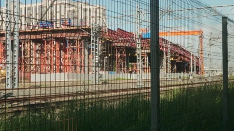 View of new bridge construction through fence. Land transport. Stock Footage 135736472