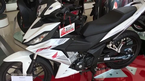 View of new Honda motorbikes in Honda head office in Da Nang city Stock Footage
