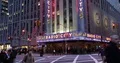 View of New York with Radio City Hall Busy Pedestrians Commuting Evening Light 4k or 4k+ Resolution