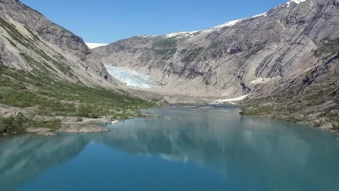 View of the Nigardsbreen Glacier. Mountains and Lake In Norway Vídeos de archivo 81569599