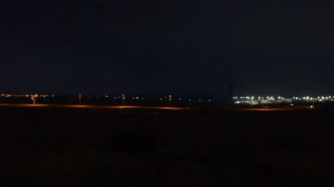 View on night road with lights of junction on background 库存影片 137369456