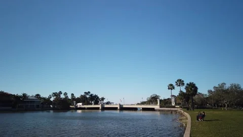 View north from Sunset Park in Saint Petersburg, FL with leading line of seawall Stock Footage 265459804