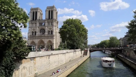 View of Notre Dame Cathedral in Paris, France on a summer day Stock Footage 105523059